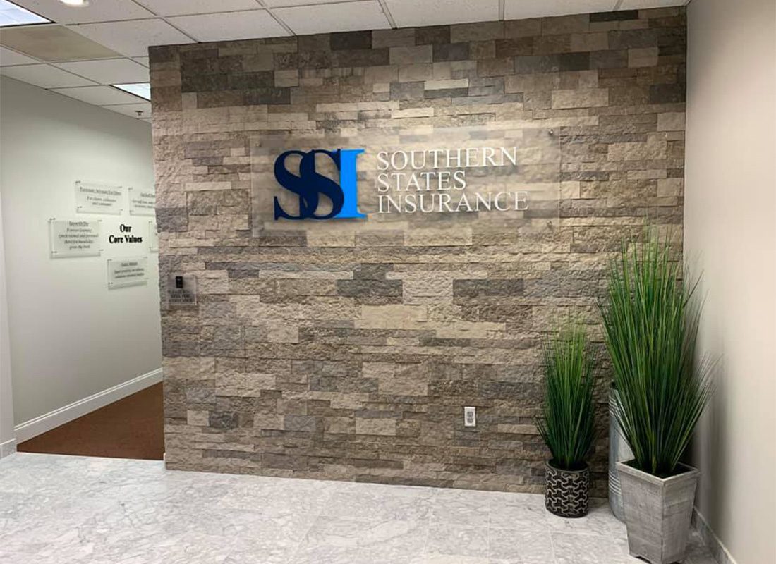 Alpharetta, GA - View of Southern States Insurance Logo Decal on a Stone Wall in the Front Lobby of the Alpharetta Georgia Office