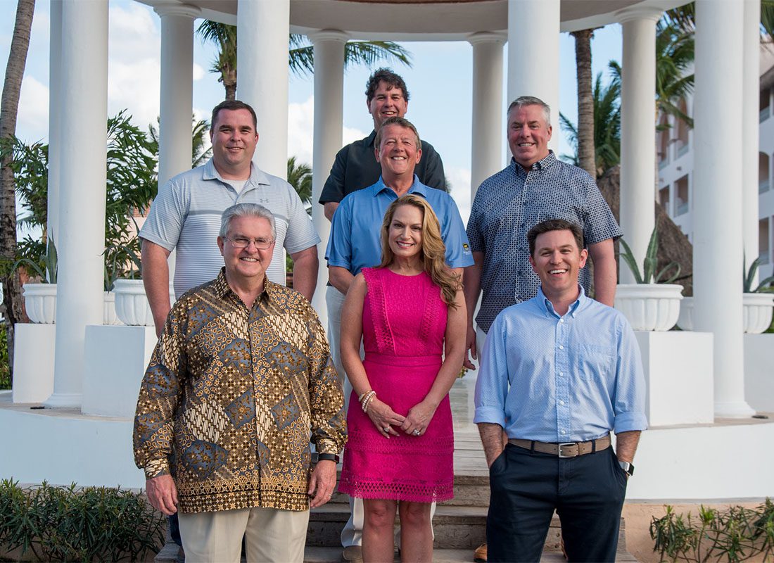 Commercial Lines Account Manager - Smiling Group Photo of Southern States Insurance Team Members Next to a Gazebo During a Reward Trip to Mexico