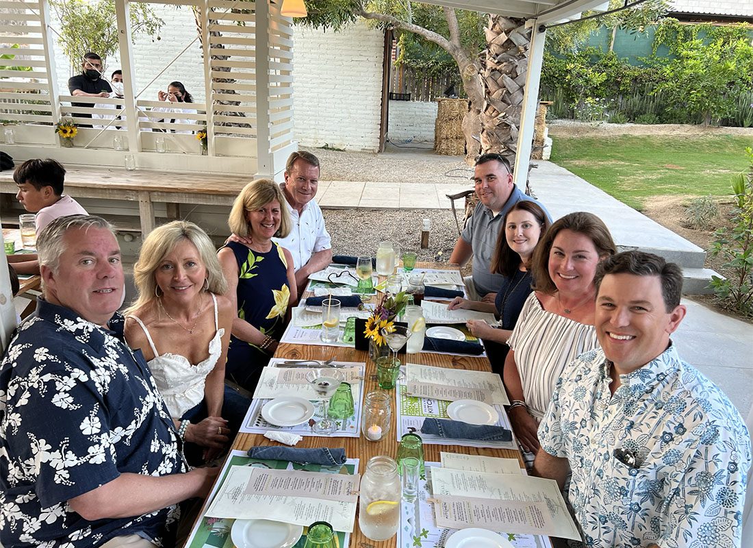 Commercial Lines Producer - Smiling Group Photo of Producers on the Southern States Insurance Team Ordering Dinner During a Reward Trip to Mexico